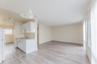 Amenities: Upgraded Kitchens • In-suite Laundry • Dishwasher Suite & Building: Two level, three-bedr... (image 8)
