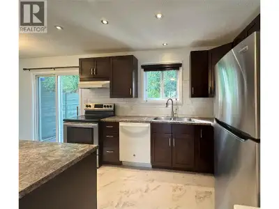 Clean, move-in ready 3 bedroom, 2 bathroom townhome in well managed Birchland Gardens. Ideal for fir...