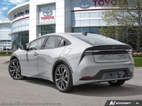Introducing the stunning 2027 Toyota Prius Plug-In Hybrid XSE in a sleek silver finish with a smooth... (image 3)