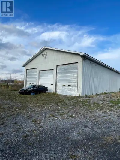 The subject building is a single story wood frame garage built in the 1990's which is 6,000 sq ft wi...