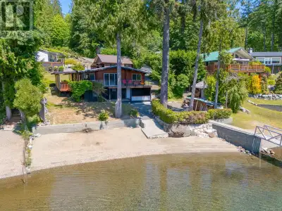 Sproat Lake living! This .90-acre lakefront property features two homes and approximately 100ft of w...