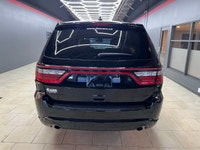 Experience the bold presence and versatility of the 2019 Dodge Durango GT in striking black with an... (image 8)