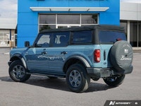 Explore the rugged charm of this 2022 Ford Bronco Big Bend, boasting a sleek Area 51 exterior and on... (image 3)