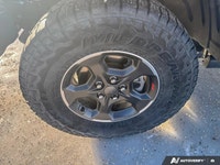 Conquer every landscape in this 2023 Jeep Gladiator Rubicon, gleaming in Hydro Blue Pearl. With only... (image 8)