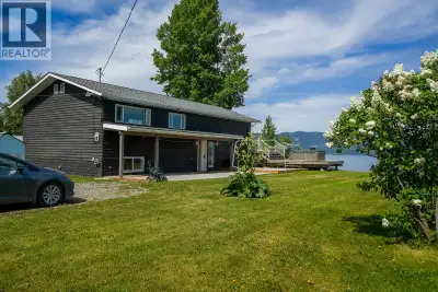 Escape to the beauty of Stuart Lake. This charming waterfront property offers breathtaking lake view...