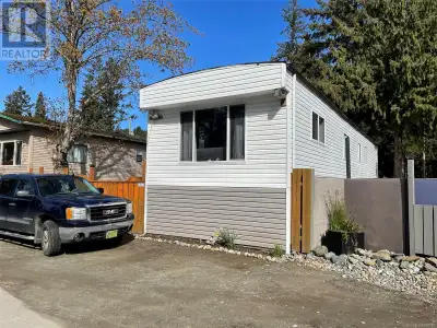 Live a vacation lifestyle daily! This 2 bedroom, 2 bath extra wide 792 sqft mobile is situated in a...