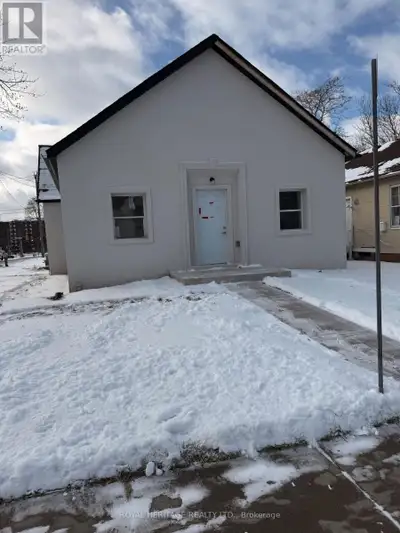 THIS HOME CAN BE EASILY USED AS ONE UNIT FOR A SINGLE FAMILY OR EASILY CONVERTED INTO 2 SEPARATE UNI...