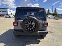 This Jeep Wrangler delivers a Gas/Electric V-6 3.6 L/220 engine powering this Automatic transmission... (image 5)