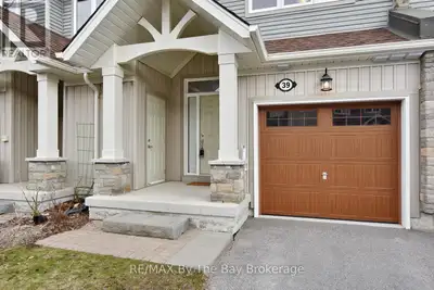 Wonderful 2 bdrm/3 bath townhome with single garage, gas f/p, full bsmt, 3 pc ensuite bath, a vaulte...