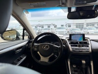 The NX 200t is characterized by its aggressive "spindle" grille and sharp, angular body lines. As th... (image 9)