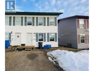 Looking for a great deal on a home with incredible potential? This half duplex is a fantastic opport...