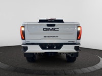 Welcome to Capital GMC! *This 2026 GMC Sierra AT4 2500HD Capital Custom Lifted Truck in Summit White... (image 3)