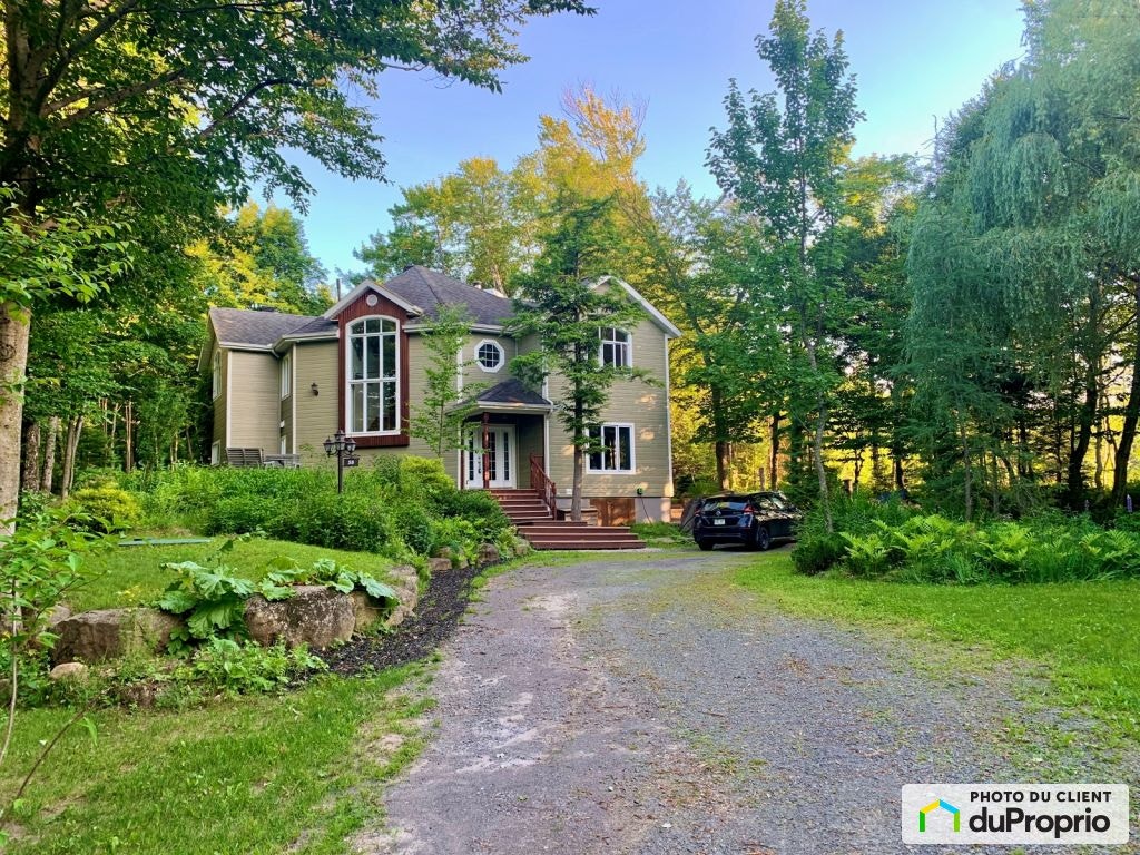 $829,000 - 2 Storey for sale in Ste-Anne-Des-Lacs — photo 1