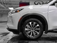 Elevate your driving experience in the sophisticated 2025 INFINITI QX60 Pure, finished in striking G... (image 6)