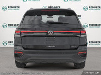 The 2025 Volkswagen Taos Comfortline Black Edition AWD is a striking blend of style and capability w... (image 4)