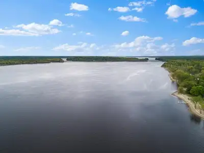 **Exceptional Waterfront Property Awaiting Your Dream Home - 133 Cottage Road, Chapeau, QC** Discove...