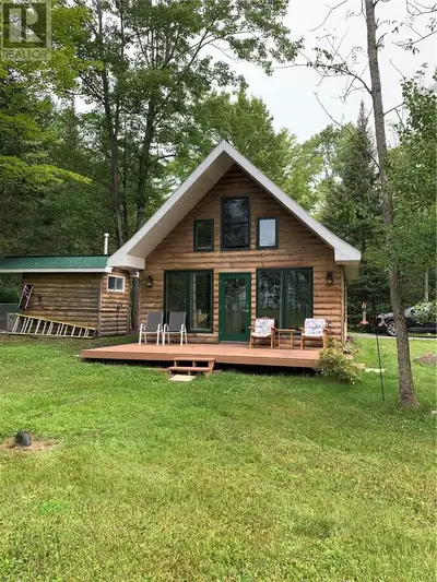 TOTALLY OFF THE GRID, APPROX 34 ACRES ON BRENNAN HARBOUR IN SPANISH, ONTARIO. CHALET STYLE HOME ,LAR...