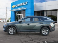 The expansive panoramic sunroof of this 2023 Hyundai Tucson Preferred offers breathtaking views, tra... (image 2)