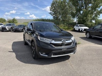 Le Honda CR-V Touring 2018 est un VUS compact haut de gamme reconnu pour sa fiabilité, son confort e... (image 2)