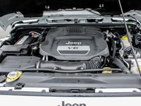 The 2018 Jeep Wrangler JK Unlimited Rubicon in stunning white with an all-wheel-drive system invites... (image 7)