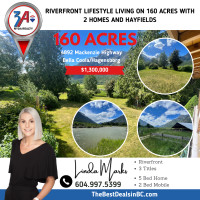 Riverfront Lifestyle  160 Acres with 2 Homes Bella Coola