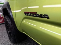 We have a RARE, SUPERCHARGED, ELECTRIC LIME METALLIC 2022 Toyota Tacoma TRD PRO 4x4! This truck look... (image 6)