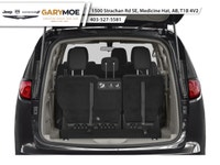 The 2026 Chrysler Grand Caravan SXT in a captivating black hue is the front-wheel drive van designed... (image 7)