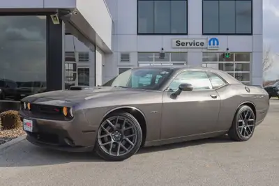 Experience classic muscle with modern flair in the 2018 Dodge Challenger R/T Shaker RWD, now availab...