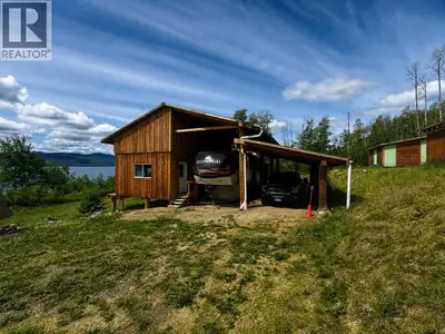 Discover 10.87 acres of exceptional waterfront on beautiful Francois Lake, featuring over 850 feet o...