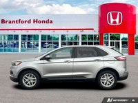 Command the road and embrace adventure in this sophisticated 2023 Ford Edge SEL, striking in Silver.... (image 1)