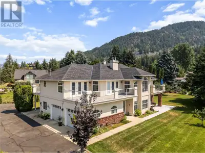 Stunning 4-bedroom, 3-bath home in Blind Bay, BC, offering panoramic Shuswap Lake views from all thr...