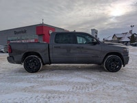 The 2026 Ram 1500 Sport makes a strong first impression in Granite Crystal Metallic, paired with a s... (image 7)