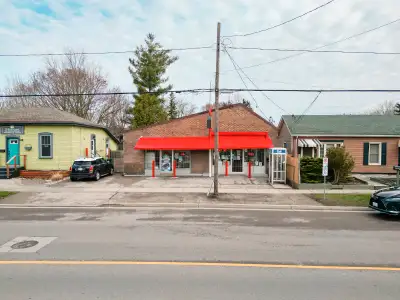 *Artist rendition included in photos 215 Grand River Avenue is a versatile and spacious 2,700 sq ft...