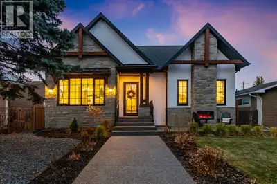 Welcome to this exquisitely crafted CUSTOM BUNGALOW by Silvertip Projects with TRIPLE GARAGE on larg...