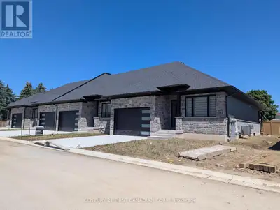MOVE-IN READY! Welcome to the Ausable Bluffs of Ailsa Craig, where quality craftsmanship meets moder...