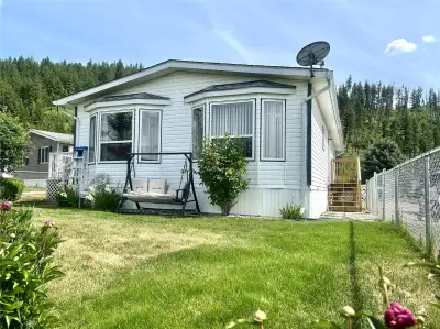 Spacious Double-Wide Home with Stunning Views in Sunset Heights 55+ MHP Perched on a prime view lot...