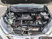 Experience the reliability and power of the 2017 Honda CR-V Touring in stunning white, equipped with... (image 9)