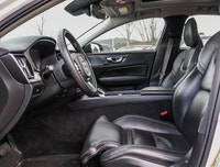 The 2024 Volvo S60 B5 AWD Ultimate Dark Theme stands out with its elegant black finish and all-wheel... (image 9)