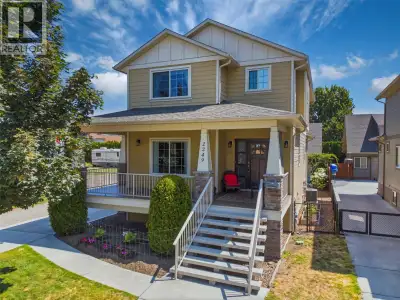 LIVE. EARN. INVEST. This exceptional craftsman-style home offers three separate living spaces, outst...