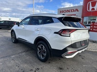 Awarded an IIHS Top Safety Pick, the 2023 Kia Sportage LX in striking Snow White Pearl ensures peace... (image 6)