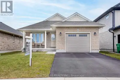 Welcome to 10 Auburn Drive, this stunning brick bungalow offers the perfect blend of modern design a...