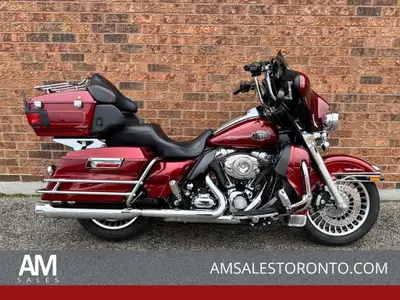 This Canadian Ultra Classic is LOADED with extras and upgrades, Shark Road pipes, detachable tour pa...