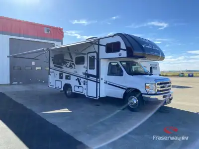 EAST TO WEST Entrada Class C gas motorhome 2000NS highlights: 60in.in. x 80in.in. Bunk Over Cab Rear...