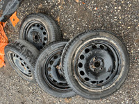 16 inch Continental  snow tires and rims for sale - 205 55 16