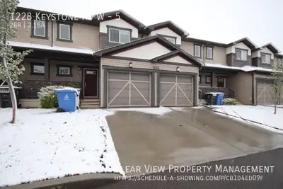 Open-plan and light-filled 2 bedroom, 2.5 bathroom with garage!