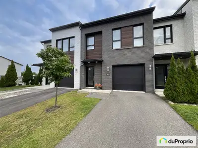 Maison de ville 2016 à Saint-Eustache - garage, grande terrasse et occupation flexible Construite en...