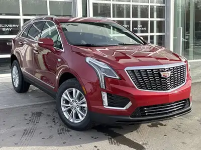 AMVIC LICENSED DEALER The 2026 Cadillac XT5 Luxury AWD, finished in Radiant Red Tintcoat with a refi...