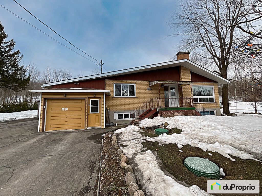 $882,000 - Bungalow for sale in Vaudreuil-Dorion — photo 1