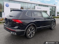 This Volkswagen Tiguan boasts a Intercooled Turbo Regular Unleaded I-4 2.0 L/121 engine powering thi... (image 4)