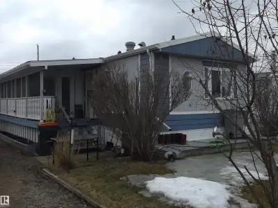 Welcome to this beautifully maintained 1,204 sq ft, 3-bedroom mobile home, perfectly situated on its...